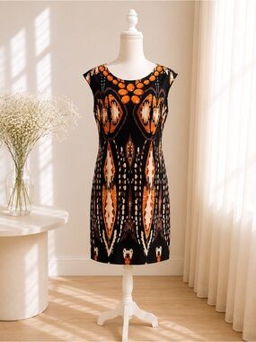Voir Voir Black Midi Dress with Bold Orange and Cream Print